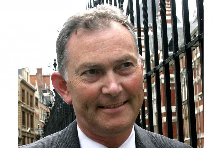 Premier League's Chief Executive Richard Scudamore (above) leaving London's High Court on July 13, 2007. Mr Scudamore spoke of his sincere contrition after it was announced on Monday he wouldn’t lose his job for sending sexist emails. -- FILE PHOTO