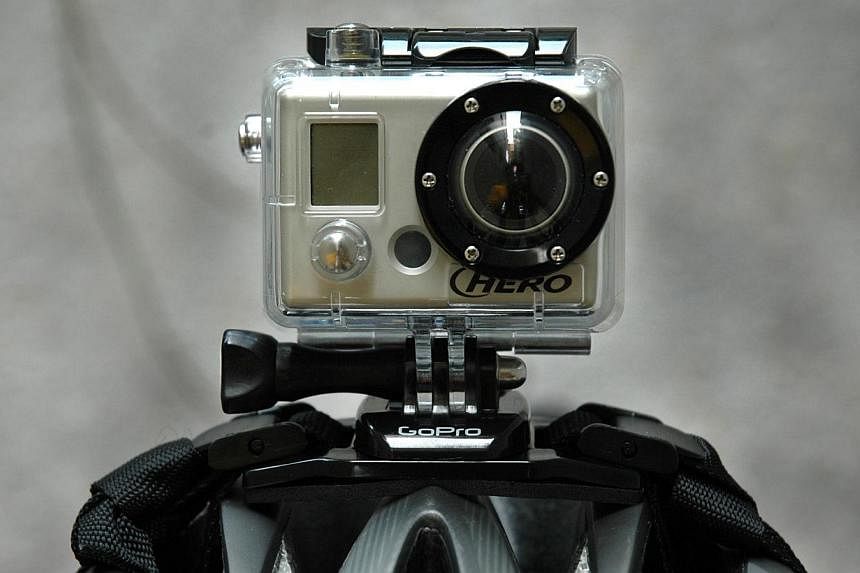 GoPro HD Helmet Hero video camera. GoPro, which makes wearable sports cameras and accessories, filed with US regulators on Monday to raise up to US$100 million (S$125 million) in an initial public offering of common stock. -- FILE PHOTO: DANSON CHEON