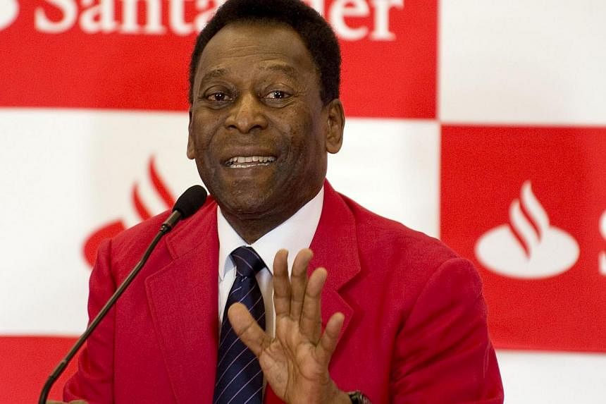 Brazilian former football star Edson Arantes do Nascimento, aka "Pele", speaks during a press conference at the Universidad Anahuac in Huixquilucan, State of Mexico, Mexico on May 19, 2014. -- PHOTO: AFP