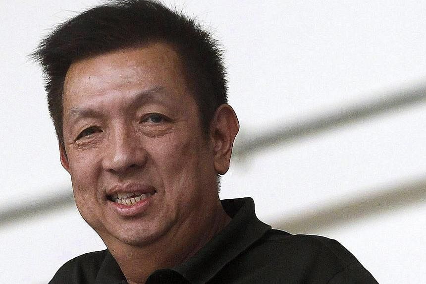 Singaporean billionaire Peter Lim during an Atletico Madrid exhibition soccer match at Jalan Besar Stadium in Singapore on May 21, 2013. -- FILE PHOTO: EPA