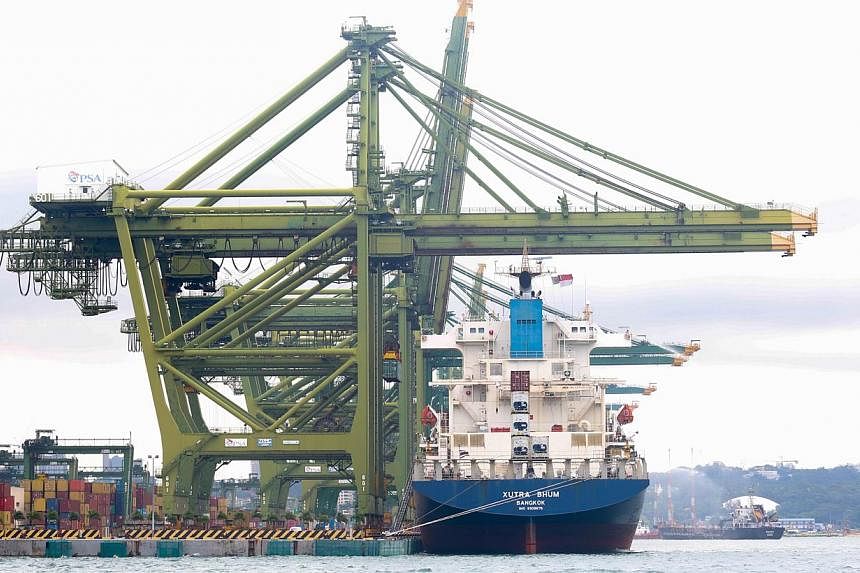 The port at Pasir Panjang. Exports from Singapore slipped 1 per cent in the first quarter of this year compared with the same period last year, according to data released by trade agency IE Singapore on Tuesday, May 20, 2014. -- ST FILE PHOTO: ONG WE