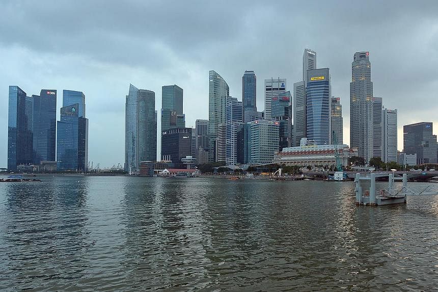 Singapore's economy grew 4.9 per cent in the first three months of the year over a year ago, the Ministry of Trade and Industry (MTI) said on Tuesday. -- ST FILE PHOTO: DESMOND WEE