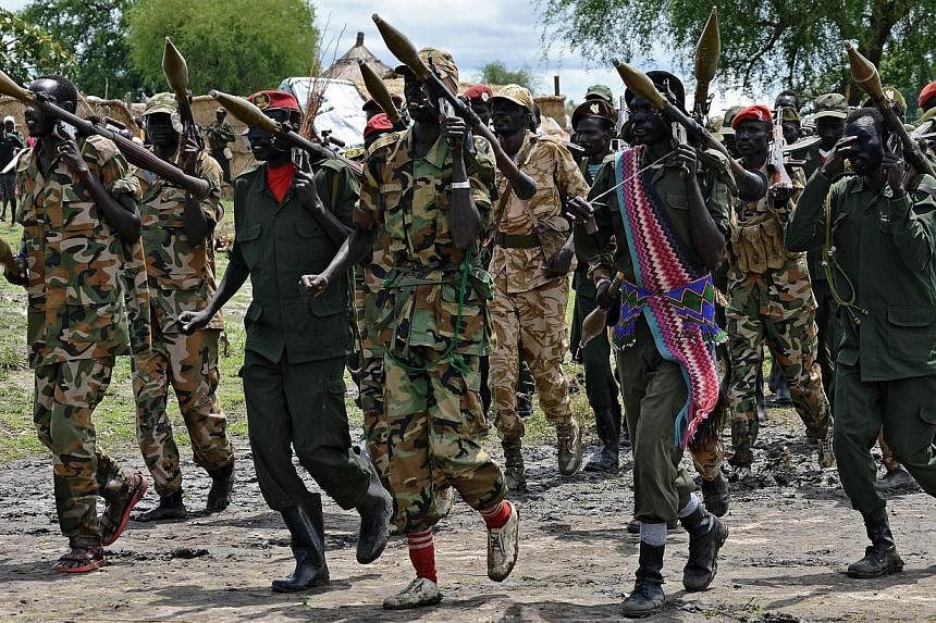 Members of the South Sudan Democratic Movement/Army (SSDM/A) faction march in Gumuruk on May 13, 2014. -- FILE PHOTO: AFP