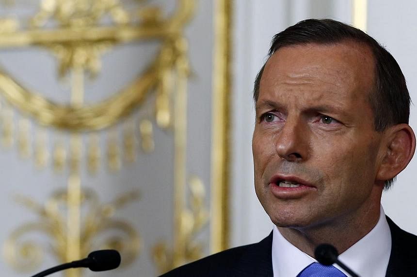Australian Prime Minister Tony Abbott warned Tuesday, May 20, 2014, the country could lose its coveted AAA credit rating if the tough measures in his government's maiden budget are not adopted. -- FILE PHOTO: REUTERS