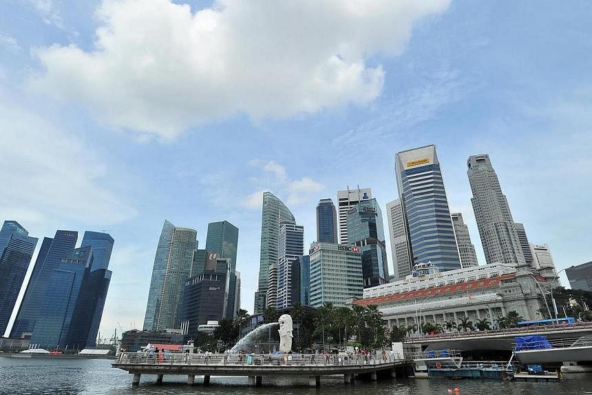 A view of the Singapore's central business district. Singapore is the sixth most expensive place in Asia to employ expats, a new survey has showed. -- ST PHOTO: LIM YAOHUI