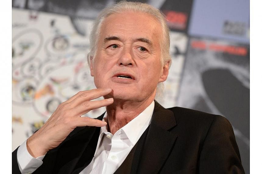 An image released on 15 May 2014 shows British guitarist Jimmy Page of the band Led Zeppelin at a press conference in Berlin, Germany, on April 16 2014. -- FILE PHOTO: EPA