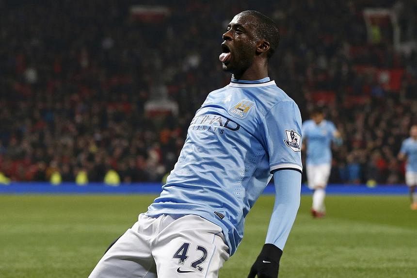 Manchester City's Yaya Toure celebrates his goal against Manchester United during their English Premier League soccer match at Old Trafford in Manchester, northern England on March 25, 2014.&nbsp;Yaya Toure’s future as a Manchester City player is i