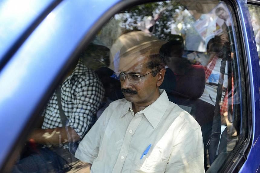 Indian Aam Admi Party leader Arvind Kejriwal is seen outside a courthouse in New Delhi on May 21, 2014. The anti-corruption campaigner was sent to jail for refusing to pay a bond, just hours after declaring he was ready to fight fresh elections in De