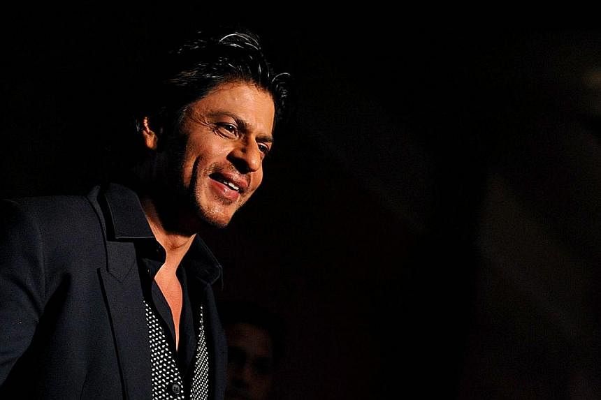 Indian Bollywood actor Shah Rukh Khan attends the Colors IAA Awards and after party in Mumbai on March 1, 2014.&nbsp;Khan is the world's second-richest actor with a fortune of US$600 million (S$752 million), according to a survey. -- PHOTO: AFP