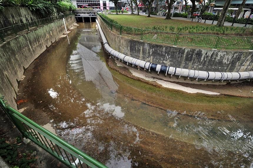 The Stamford Canal at the junction of the Orchard and Killiney Roads. The new diversion canal will connect the upstream section of Stamford Canal to the Singapore River. -- PHOTO: ST FILE