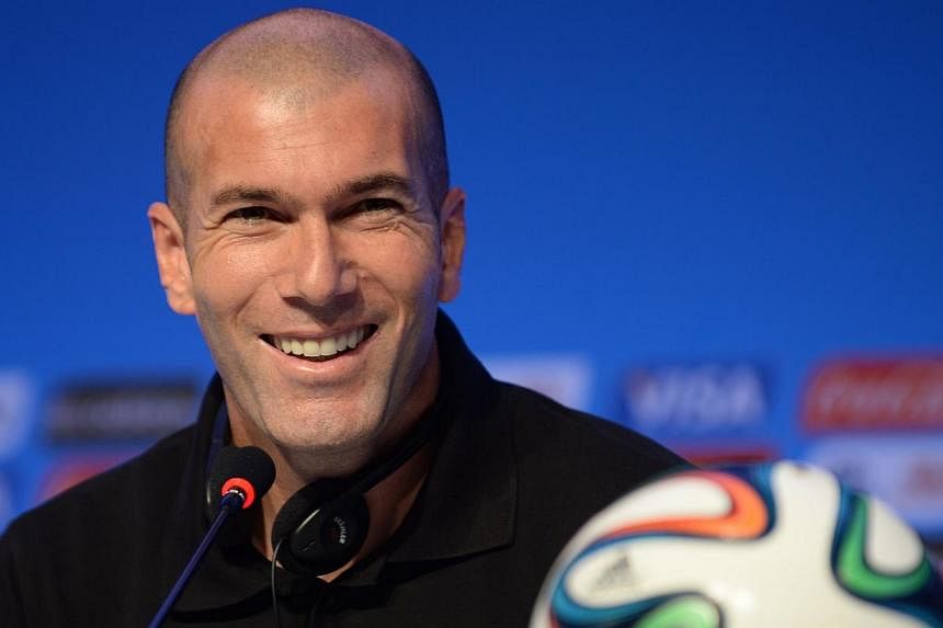 This file picture dated on Dec 5, 2013 shows French footbal star Zinedine Zidane giving a press conference on the eve of the Brazil 2014 FIFA Football World Cup final draw, in Costa do Sauipe, state of Bahia. -- PHOTO: AFP