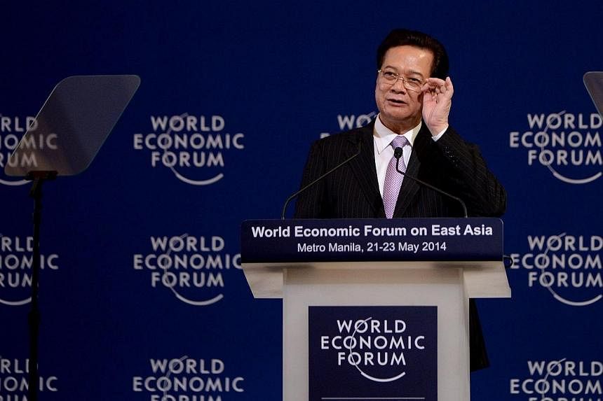 Vietnam Prime Minister Nguyen Tan Dung speaks during the World Economic Forum on East Asia in Manila on May 22, 2014. -- PHOTO: AFP