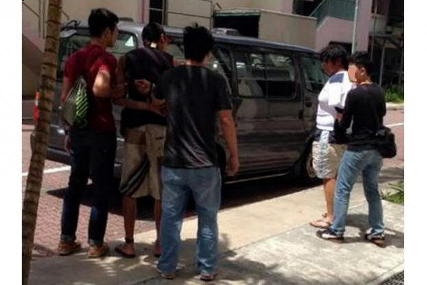 Suspects being arrested by Central Narcotics Bureau officers during one of the operations conducted from Monday to Thursday. -- PHOTO: CENTRAL NARCOTICS BUREAU