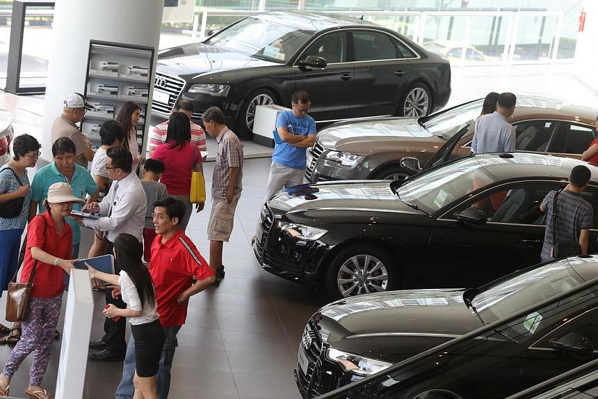Potential car buyers at the Audi showroom at Alexandra Road. -- PHOTO: ST FILE