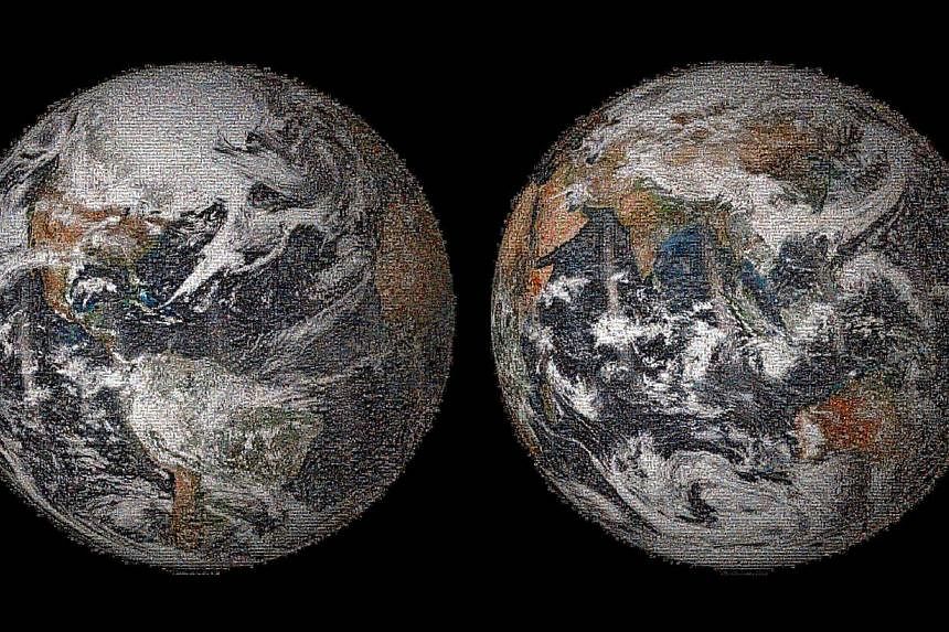This image released on May 22, 2014 by NASA shows the “Global Selfie” Earth mosaic containing more than 36,000 individual photographs from the more than 50,000 images posted around the world on Earth Day, on April 22, 2014. -- PHOTO: AFP
