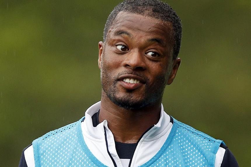 France left-back Patrice Evra has signed a contract to stay at Manchester United for another year, extending his Old Trafford career to a 10th season. -- PHOTO: REUTERS