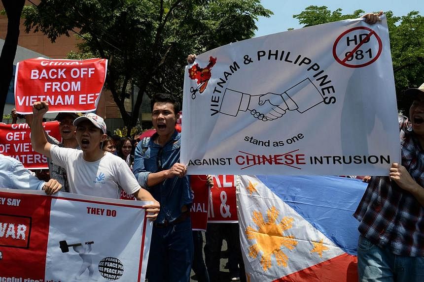 Vietnamese and Philippine protesters shouting anti-China slogans in front of the Chinese consular office in Manila earlier this month. The three countries are locked in disputes over the South China Sea.