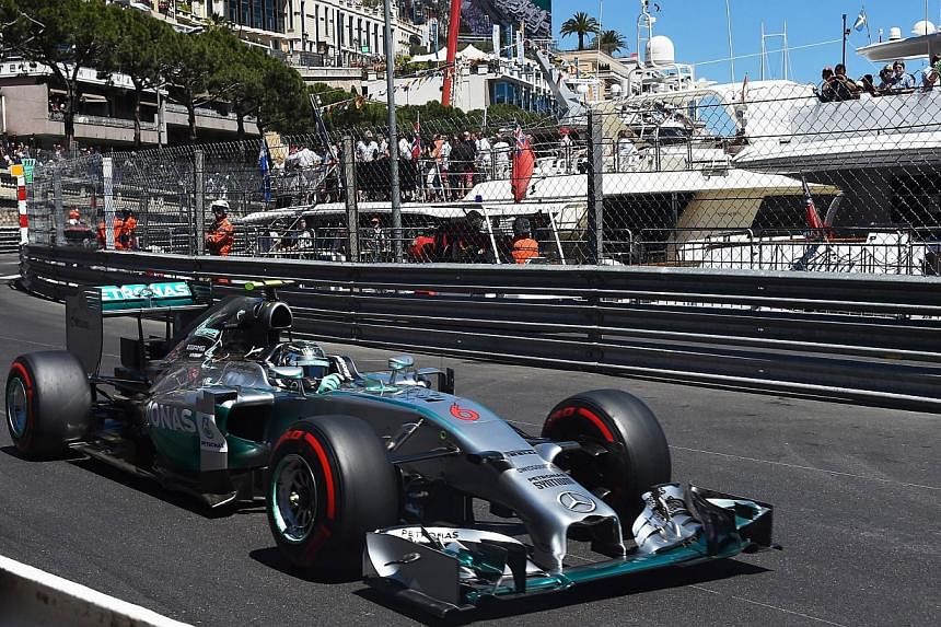 Mercedes' German driver Nico Rosberg drives at the Monaco street circuit during the qualifying session of the Monaco Formula One Grand Prix in Monte Carlo on May 24, 2014. -- PHOTO: AFP