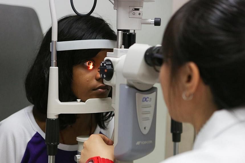 S. Loshinni, 14, having her eyes examined.&nbsp;Not being able to see well, or at all, is worse than suffering from diabetes, obesity, hypertension and high cholesterol levels, a study has found. -- FILE PHOTO: ST