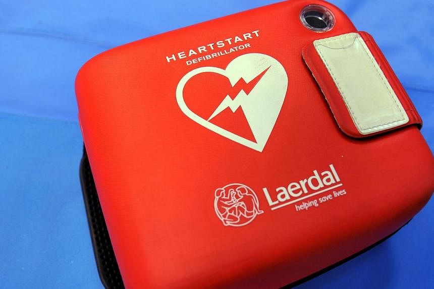 Automated External Defibrillators (AEDs), which are used in the event an individual suffers a heart attack, will be installed in all 107 community centres and clubs in Singapore by the end of the year. -- ST FILE PHOTO
