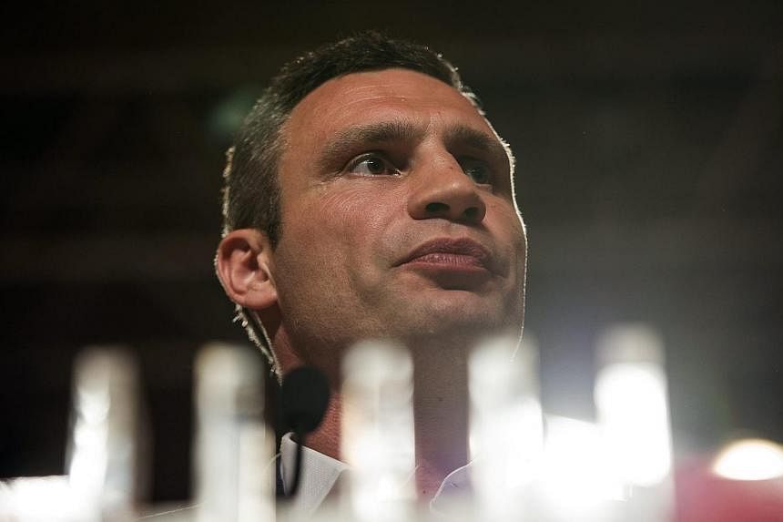 Leader of UDAR party and former heavyweight boxer Vitali Klitschko speaks during his press conference at Poroshenko's election headquarters in Kiev, Ukraine on 25 May 2014. -- PHOTO: EPA