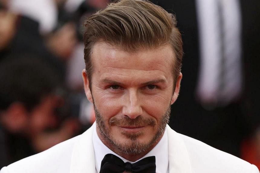 Football star David Beckham will be arriving in Singapore next month as part of a Marina Bay Sands (MBS) initiative to reward its Facebook followers from Singapore, Malaysia, Indonesia, Korea and China. -- PHOTO: REUTERS