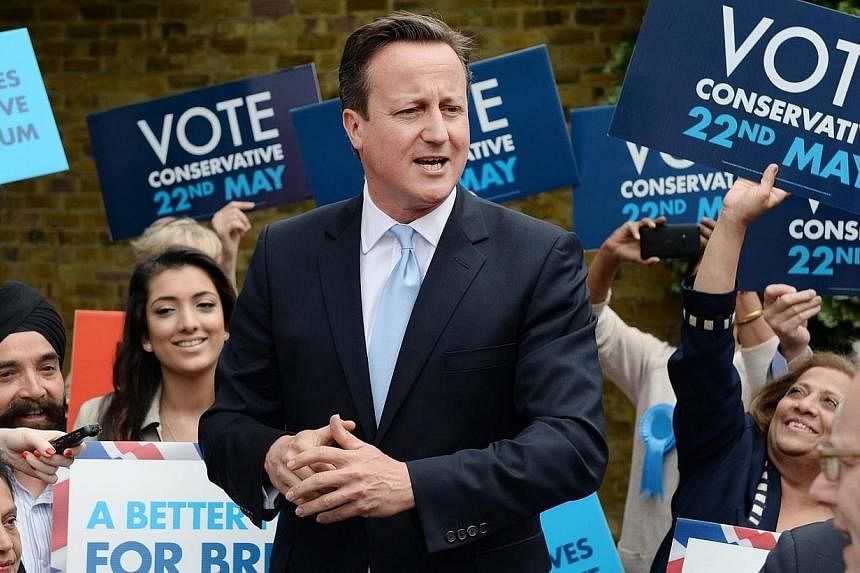 British Prime Minister David Cameron (centre) holds an election rally ahead of European elections in Ealing, west London, on May 21, 2014.&nbsp;Mr Cameron will launch an assault against "business as usual" at a summit in Brussels on Tuesday, May 26, 