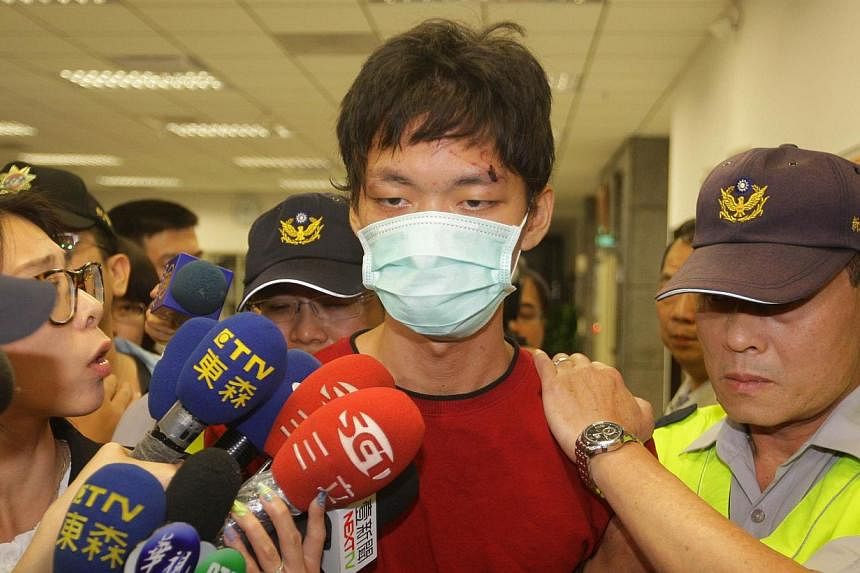 The mother and father of 21-year-old Cheng Chieh (above), who killed four people in a stabbing spree in Taipei, apologised to victims' families on May 27, 2014, and asked their son to be executed as soon as possible. -- PHOTO: AFP&nbsp;