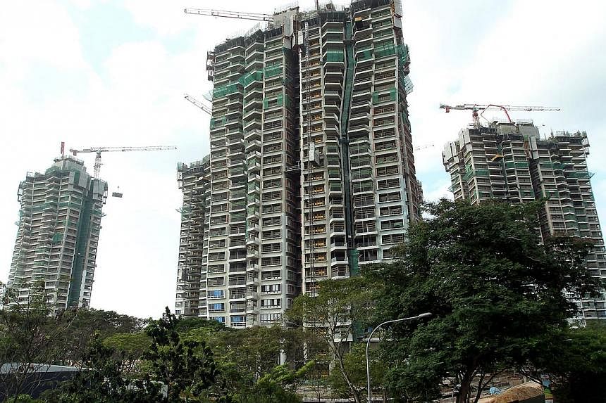 The National Environment Agency (NEA) issued four stop work orders at the D'Leedon (above) and Leedon Residence condominium projects in the Holland area between April 10 and May 15. -- PHOTO: ST FILE