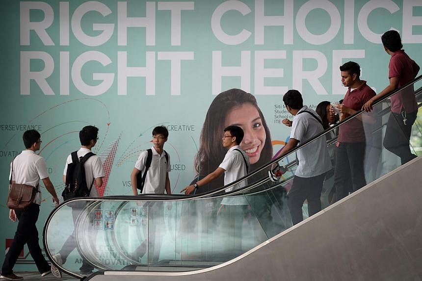Students at ITE College Central in Ang Mo Kio. A survey found almost six in 10 ITE students and four in 10 polytechnic students want to get their next qualification right after graduating even though they can be employed. They are worried that if the