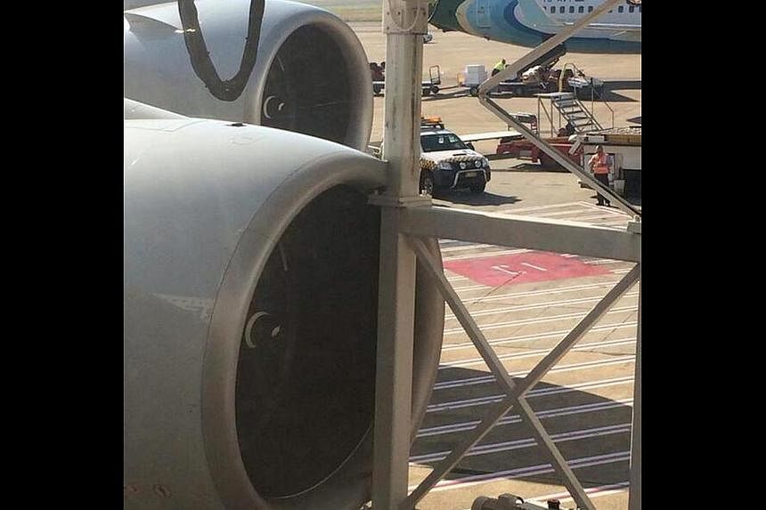 The SIA A-380 hit an aerobridge while taxiing, damaging one of its four engines. There were no injuries among the 311 people on board. -- PHOTO: ALEX CHAPMAN/TWITTER