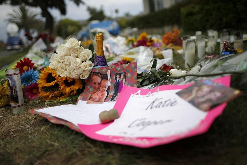 A makeshift memorial is seen in front of the Alpha Phi sorority house where two women were killed in the Isla Vista neighborhood of Santa Barbara, California on May 26, 2014. -- PHOTO: REUTERS