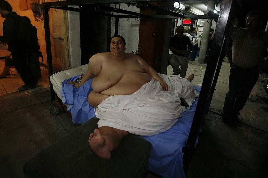 Mexican Manuel Uribe, then with 40 years old and weighing 597 kilograms, in Monterrey, Mexico on Jan 17, 2006. Uribe died on 26 May 2014,-- PHOTO: REUTERS