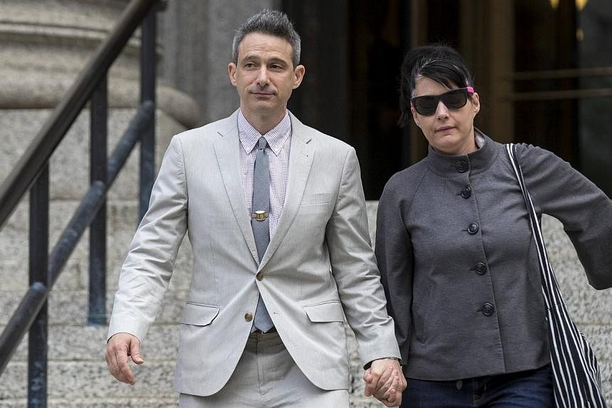 Beastie Boys member Adam Horovitz, also known as Ad-Rock, exits the U.S. District Court for the Southern District of New York in Lower Manhattan with his wife punk singer Kathleen Hanna on May 27, 2014. -- PHOTO: REUTERS