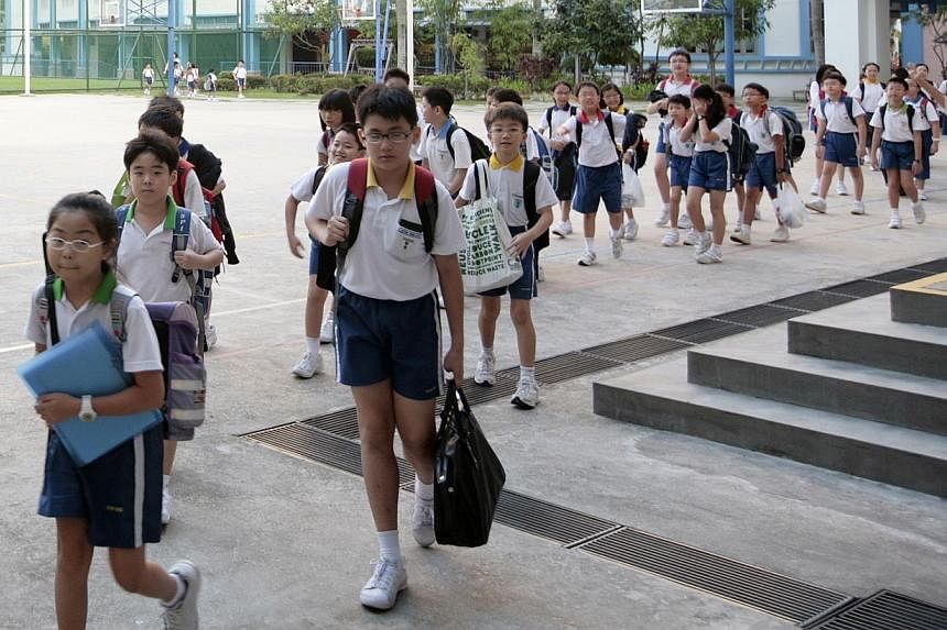 Starting from school to the workplace and society at large, the Government is moving to make sure that pathways remain open for all Singaporeans in every stage of their lives. -- PHOTO: ST FILE