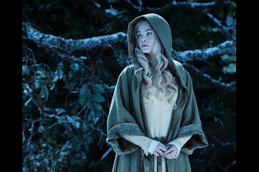 Actress Elle Fanning grew up identifying with the character of Sleeping Beauty, a role she plays in the movie Maleficent (above). -- PHOTO: WALT DISNEY STUDIOS MOTION PICTURES, SINGAPORE