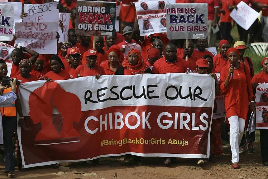 Nigerians protest over the abducted Chibok School girls in Lagos, Nigeria on May 27, 2014. -- PHOTO: EPA
