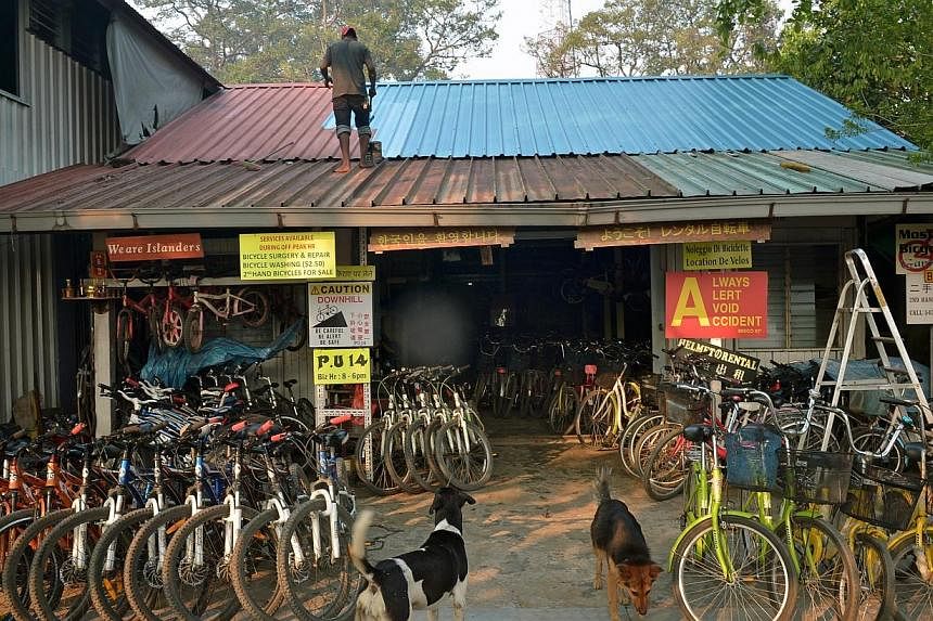 A bicycle shop on Pulau Ubin. The project to redevelop Pulau Ubin is a good opportunity for active citizens to work with the Government, said Minister of State for National Development Desmond Lee on Wednesday as he spoke about how the Government and