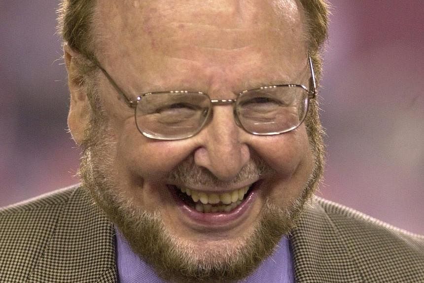 A file photograph dated Oct 6, 2003 shows Malcom Glazer smiling before an NFL American Football game between the Tampa Bay Buccaneers and the Indianapolis Colts, at Raymond James Stadium in Tampa, Florida, USA. Manchester United fans on Wednesday pai