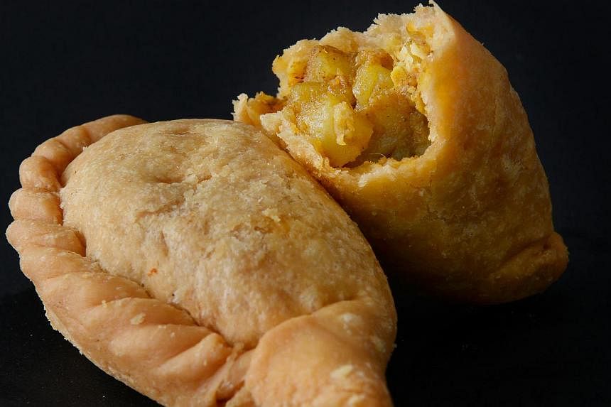 Curry puffs from Old Chang Kee. -- PHOTO: THE NEW PAPER FILE