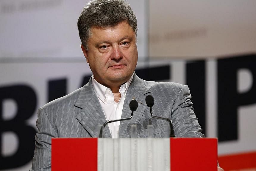 Ukrainian businessman, politician and presidential candidate Petro Poroshenko attends a news conference in Kiev on May 26, 2014. -- PHOTO: REUTERS