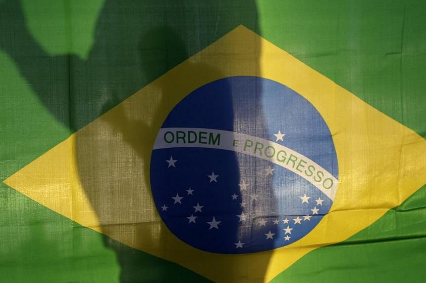 The world should judge Brazil on how well it hosts the World Cup and not assume recent protests and strikes will derail the event, a government minister said on Wednesday, May 28, 2014. -- PHOTO: REUTERS