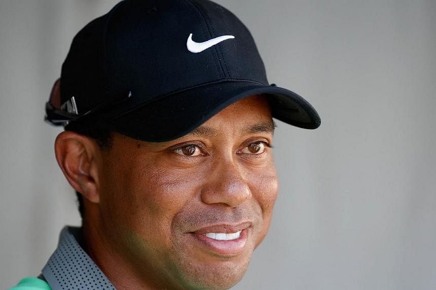 Tiger Woods, struggling to return to top form after undergoing back surgery, will not play in the 2014 US Open next month, he announced on his website on Wednesday. -- PHOTO: AFP