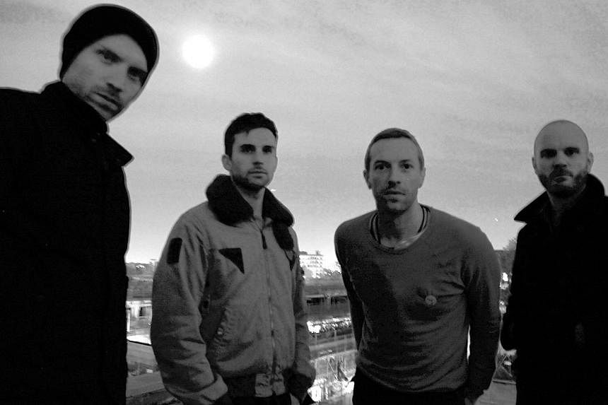 Music indie group Coldplay includes Chris Martin (third from left) being the frontman who has a new album, Ghost Stories. -- PHOTO: PARLOPHONE&nbsp;