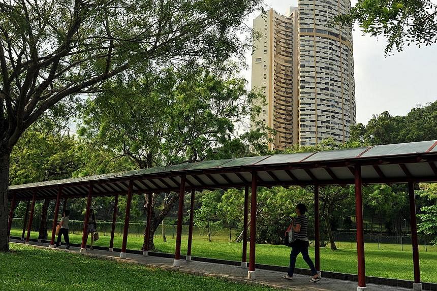 Commuters residing in north-eastern and north-western Singapore will soon get sheltered walkways that stretch up to 400m from 59 MRT stations. -- PHOTO: ST FILE