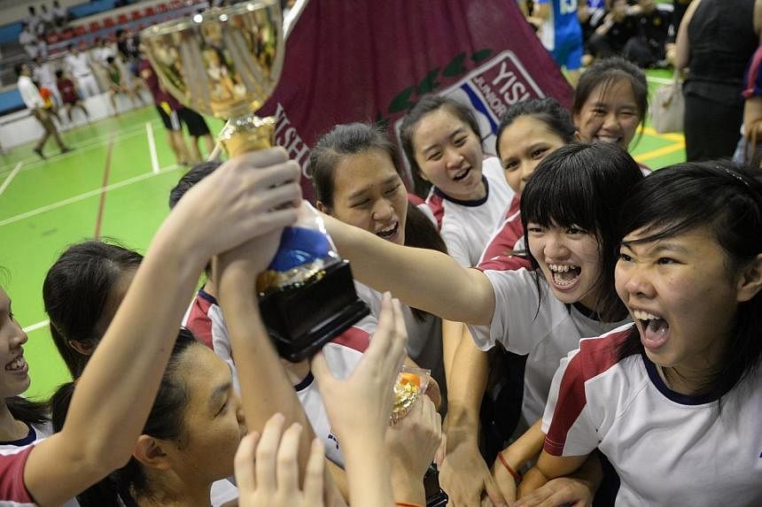 Yishun JC players celebrate after winning the final of the girls' Schools National A Division Floorball finals&nbsp;on Thursday, May 29, 2014.&nbsp;-- ST PHOTO:&nbsp;MARK CHEONG