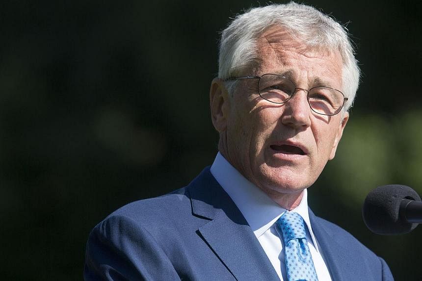 US Defense Secretary Chuck Hagel speaks during the opening of the "National Reading of the Names" ceremony near the Vietnam Memorial in Washington on May 24, 2014. -- PHOTO: REUTERS