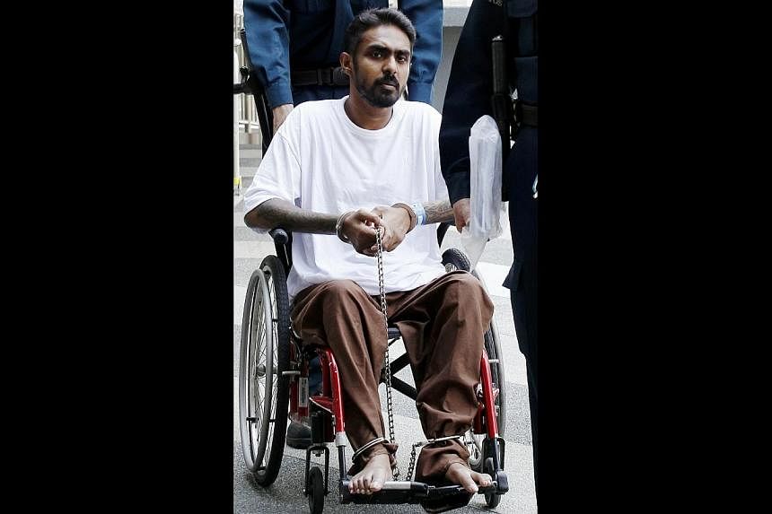 Two men, Easudas Jason (pictured) and Saravanan Uthasverian,&nbsp;were on Friday, May 30, 2014, sentenced to jail terms and caning over a conspiracy to extort money from victims, using a fake online advertisement for social escort services. -- ST PHO