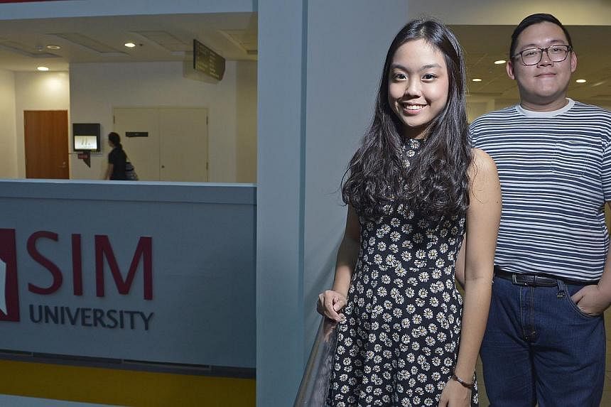 Ms Ng Wai Ling will study accountancy and is attracted to the work attachments that UniSIM offers. Mr Tan Jun Han will study marketing and looks forward to taking courses with working adults. -- ST PHOTO: DESMOND WEE