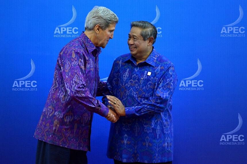 John Kerry (left), US Secretary of State, being greeted by President of Indonesia, Dr Susilo Bambang Yudhoyono, before the gala dinner held at the Bali Nusa Dua Convention Centre during the Asia-Pacific Economic Cooperation (APEC) Leaders' Week 2013 